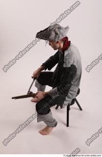 11 2019 01 JACK PIRATE SITTING POSE WITH GUN
